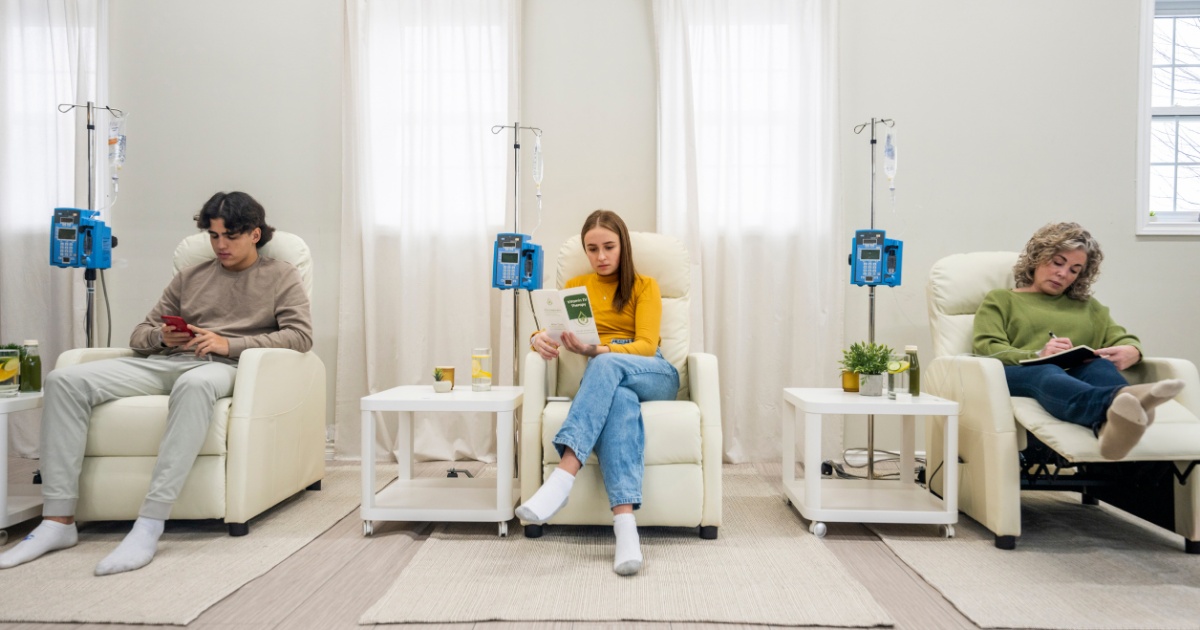 Immunity vitamin drip surrounded by oranges and lemons